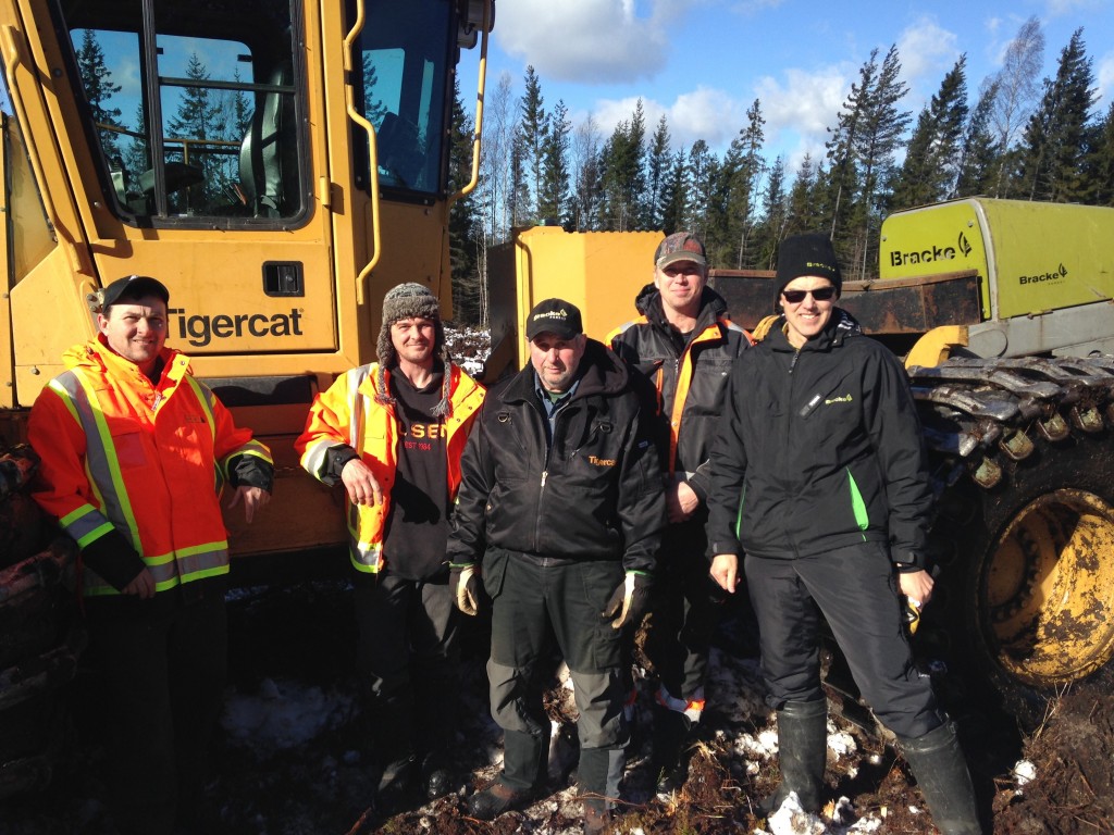 Jack MacDonald visited Sweden last year to see the Tigercat carrier with Bracke three row attachment working in the field. This trip to Sweden led Jack to decide to purchase his first Tigercat scarifier as his prime mover. (L-R) HRI owner, Jack MacDonald; HRI field mechanic/foreman, Shilo MacDonald; visiting Swedish owner/operators and president of Bracke, Klas-Håkan Ljungberg.