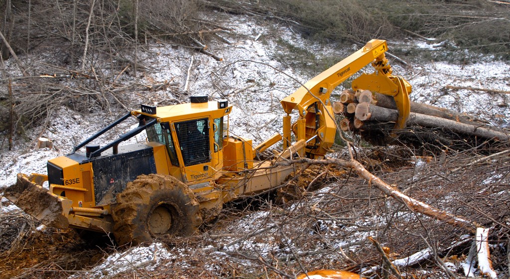 The newest family member, a 635E six-wheel bogie skidder making its way down the steep skid trail (over 40% grade in some spots).