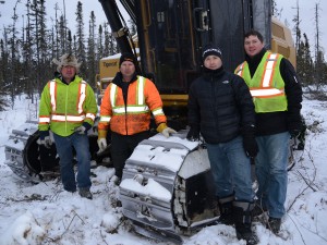James Farquhar (Tigercat district manager), Bernie Anderson (owner of Anderson Logging), Mark Elliot (Wajax sales specialist) and Blaine MacDonald (Tigercat product support).