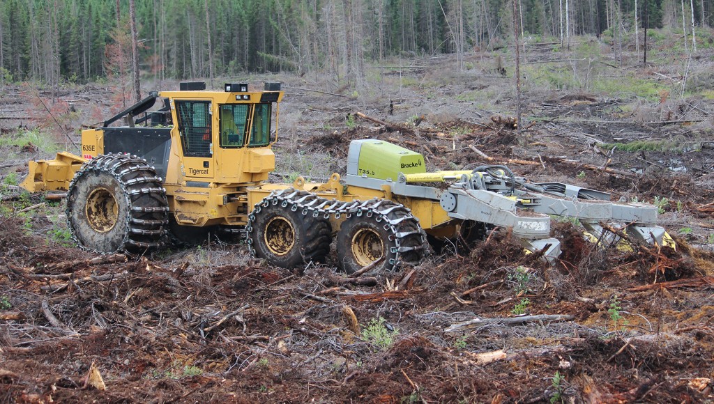 Tigercat 635E scarifier preparing the land for replanting of jack pine in Sudbury, ON.
