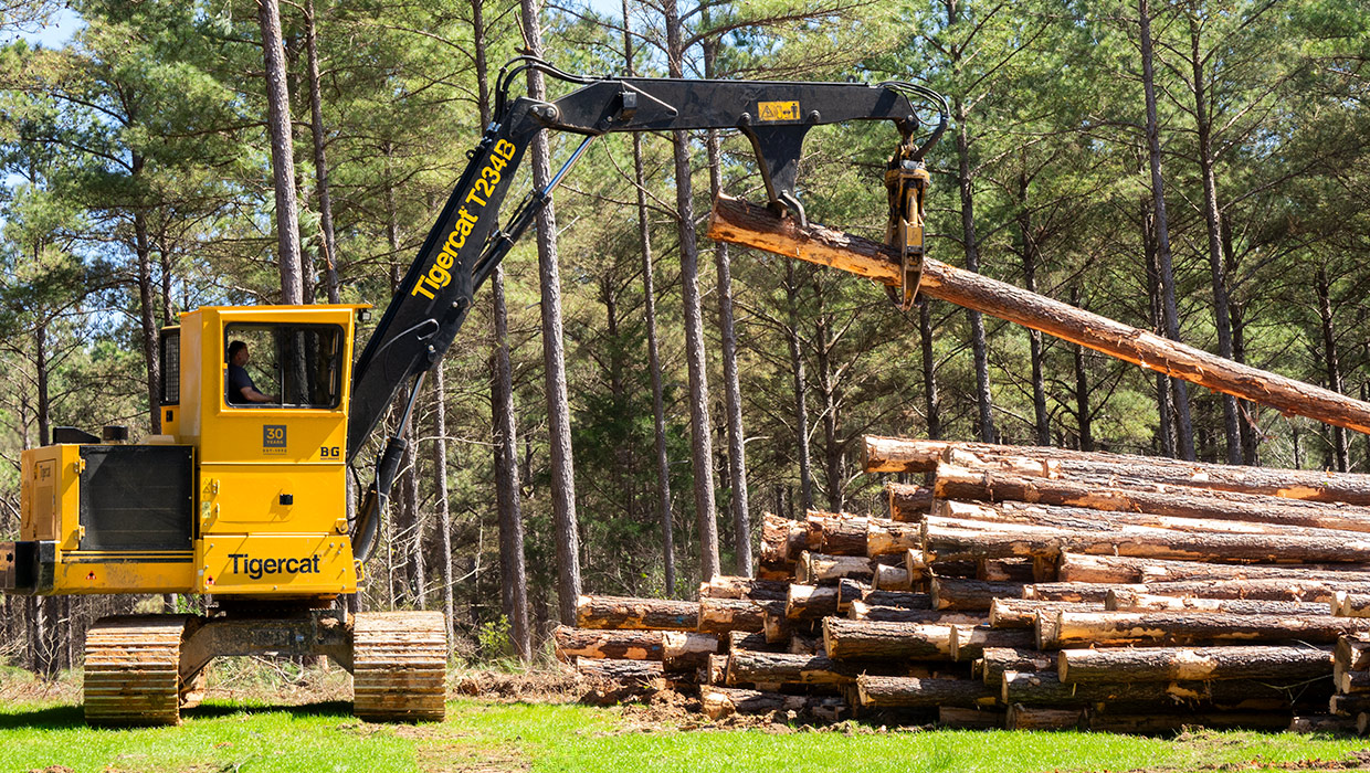 Image of a Tigercat T234B loader working in the field.