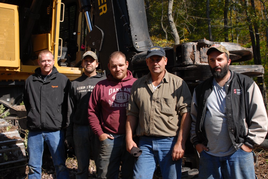 The J&B Logging Inc. crew soon after taking delivery of the LX830C in late 2010. Standing in front of the LX830C
