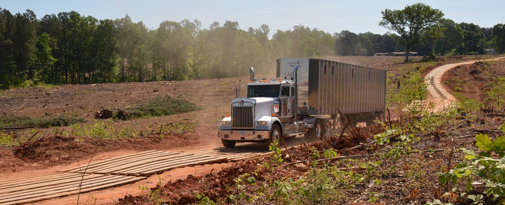 C.K. owns six of his own trucks and trailers. The log trucks won’t get stuck on this well constructed mat road.