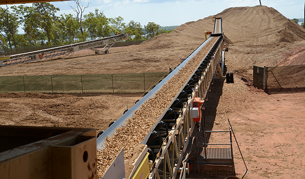 The conveyors deployed in the screening and stockpiling are repurposed during loading to move the chips between the reclaim hopper and the ship.