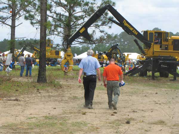 Tigercat owner and CEO, Ken MacDonald, catching up with Timmy Dopson at the Tidewater Demo Day in April 2015.