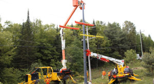 Picture of two AD610 machines fixing hydro lines