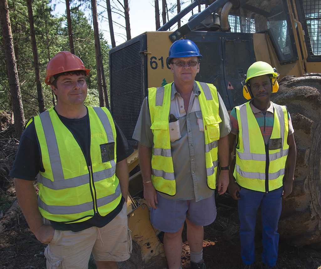 Operations manager, Deon Alexander, owner, Grant Rankin, and 610C skidder operator, Sipo Madondo.
