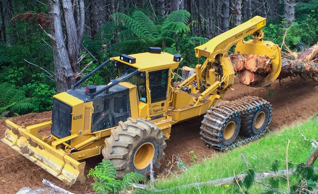 Band tracks on a Tigercat 6-wheel skidder.