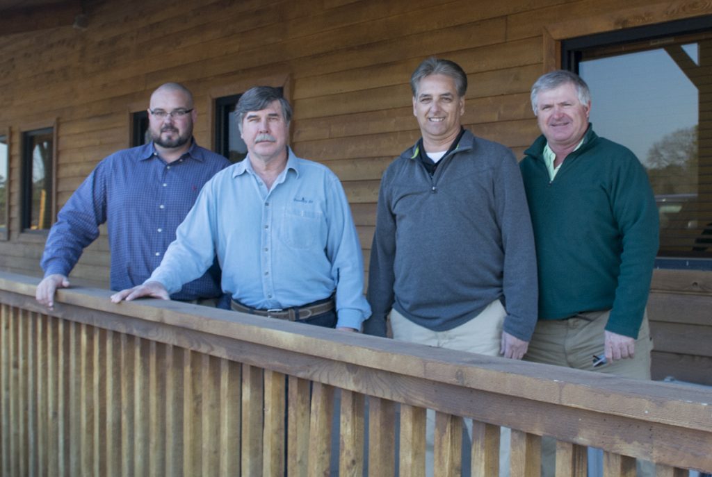 Outside the McCoy Grading headquarters in Greenville, Georgia. (L-R) Daniel McCoy, VP operations, McCoy Grading Inc.; Ricky McConnell, president, Forestry 21; Lewis Grier, sales specialist, Forestry 21; Johnny Boyd, district manager, Tigercat.