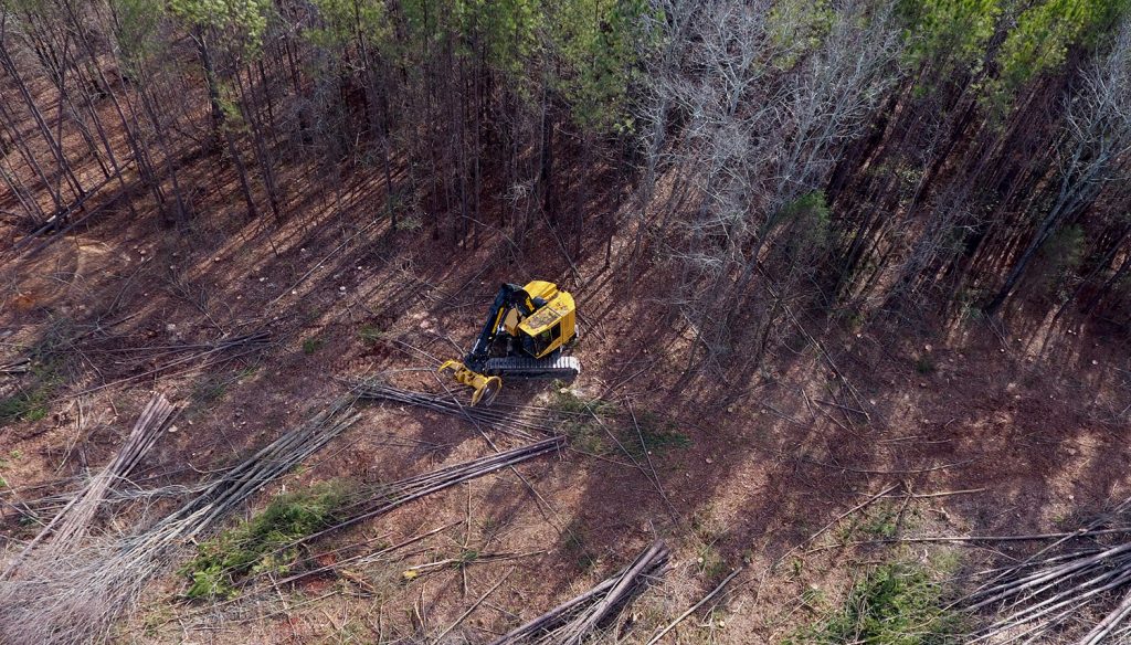 An aerial view of the LX830D feller buncher on a 30-acre (12-hectare) industrial site being graded for a trailer dealership along I75 in Forest Park, Georgia.