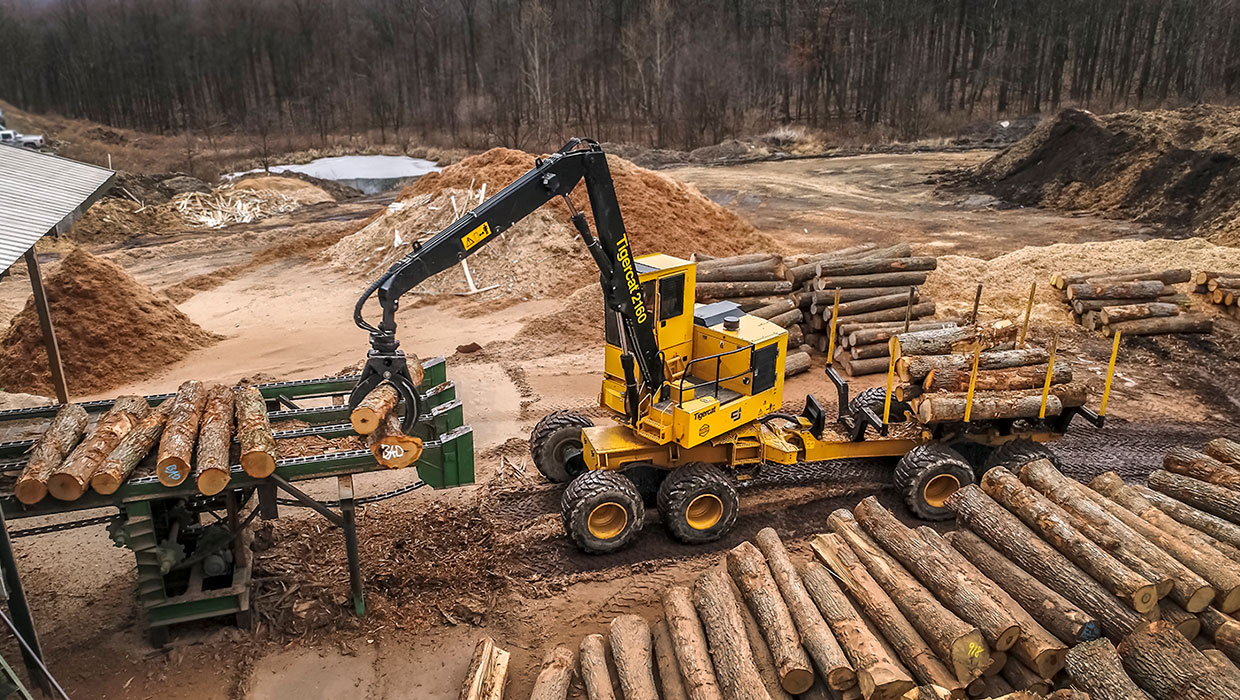 Image of a Tigercat 2160 loader forwarder working in the field