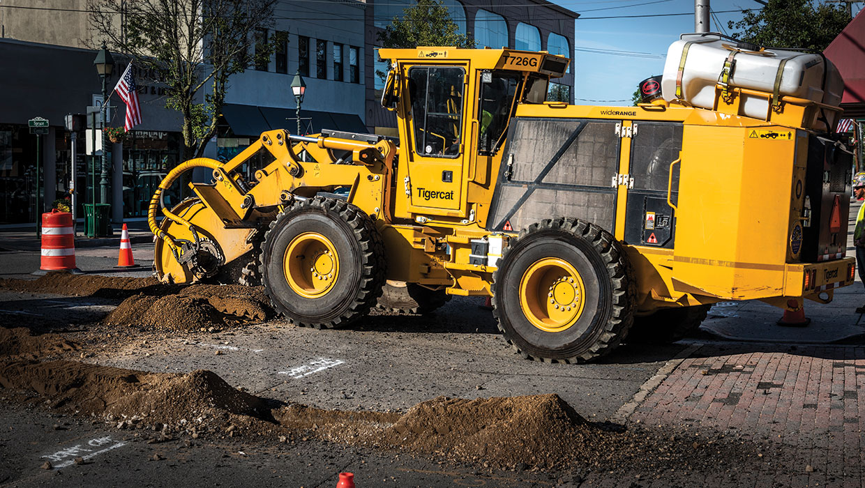 Image of a Tigercat T726G street trencher working in the field