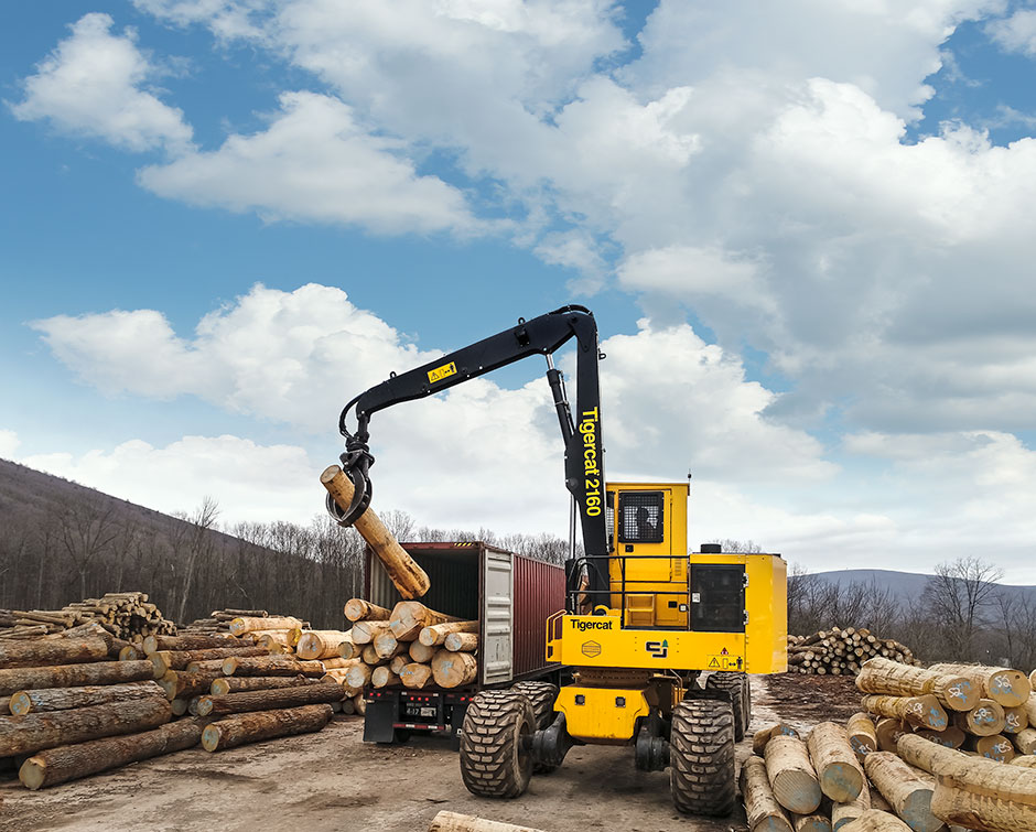 The 2160 loading logs in a container for export