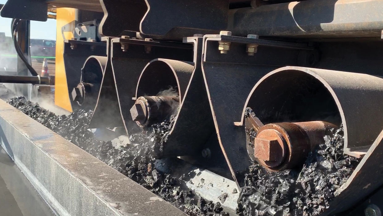 Image of 6050 augers producing biochar