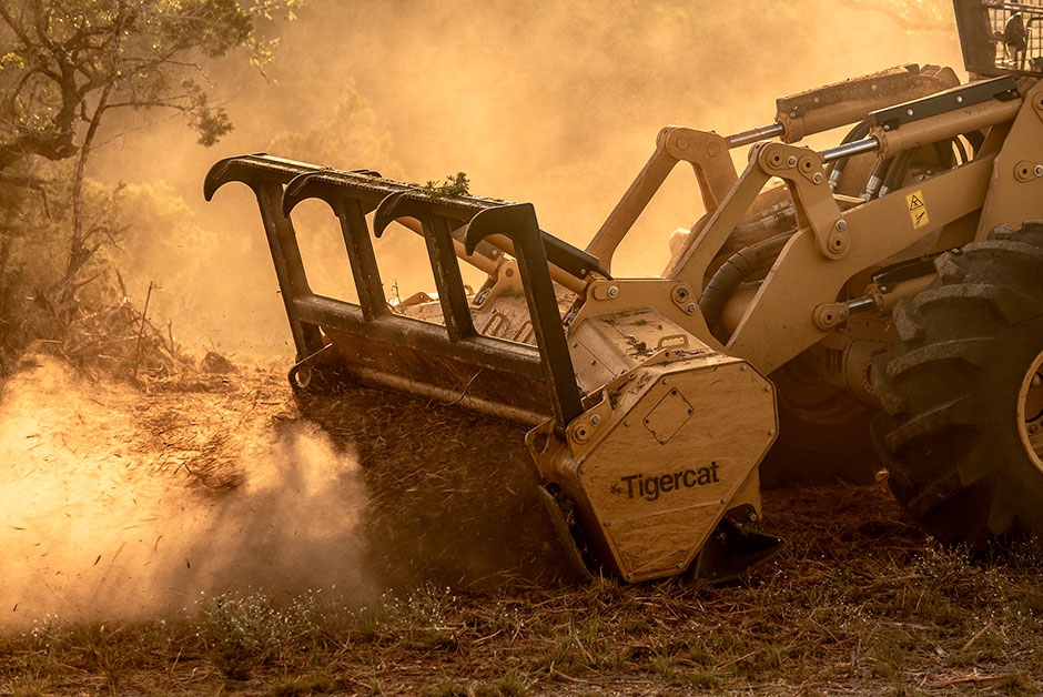 Tigercat 4061 mulching machine attachment head.