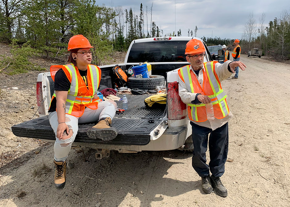 Loggers in safety gear.