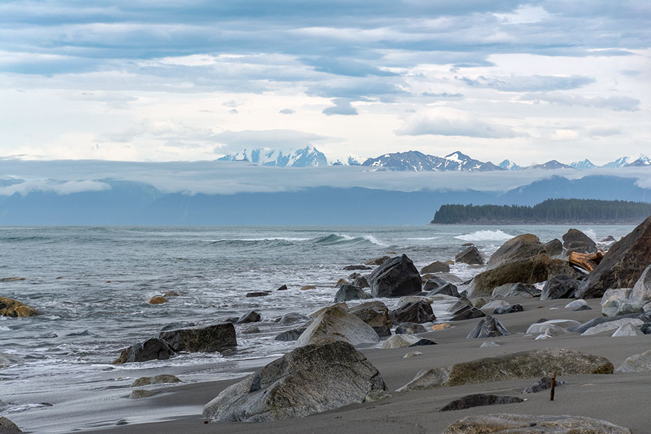 Coastal Alaska scene with mountains in the background