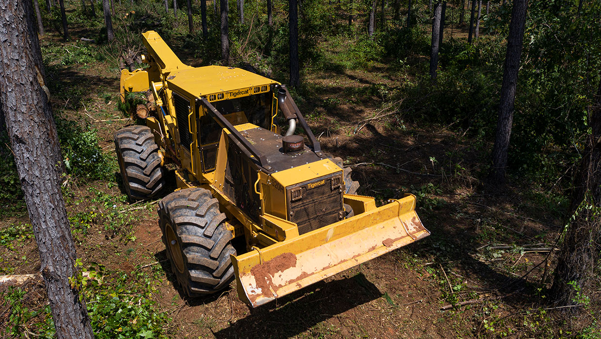 Image of a Tigercat 620H skidder working in the field