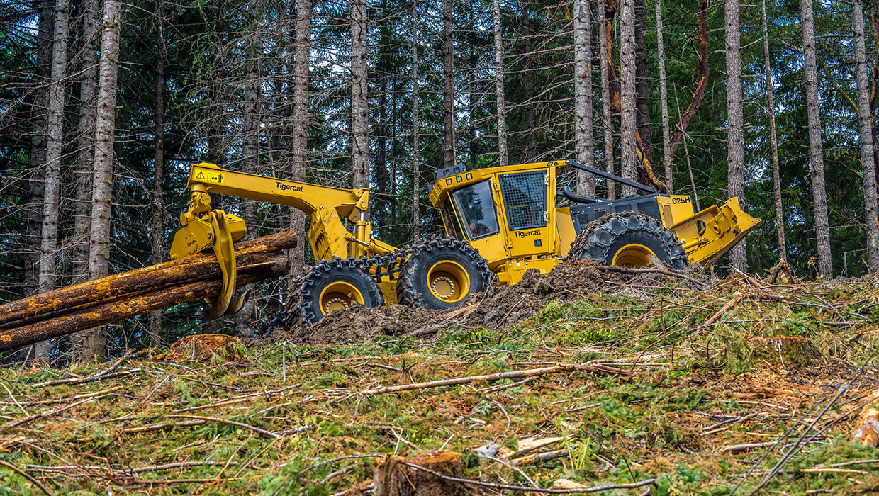 Image of a Tigercat 625H skidder working in the field
