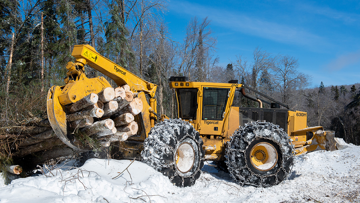 Image of a Tigercat 630H skidder working in the field