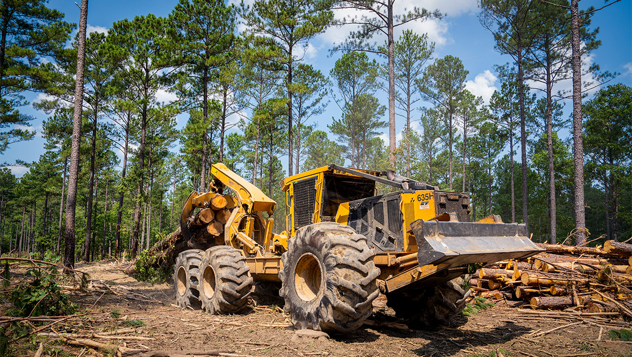 Image of a Tigercat 635H bogie skidder working in the field