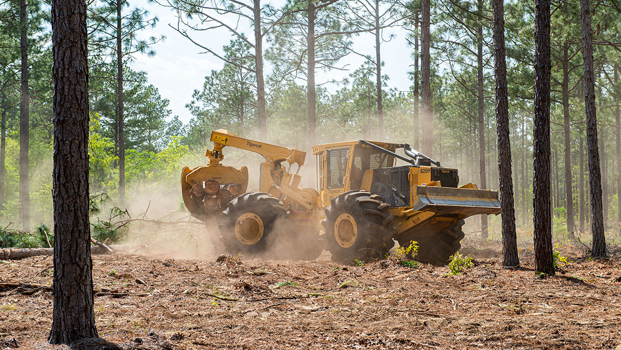 Image of a Tigercat 620H skidder working in the field