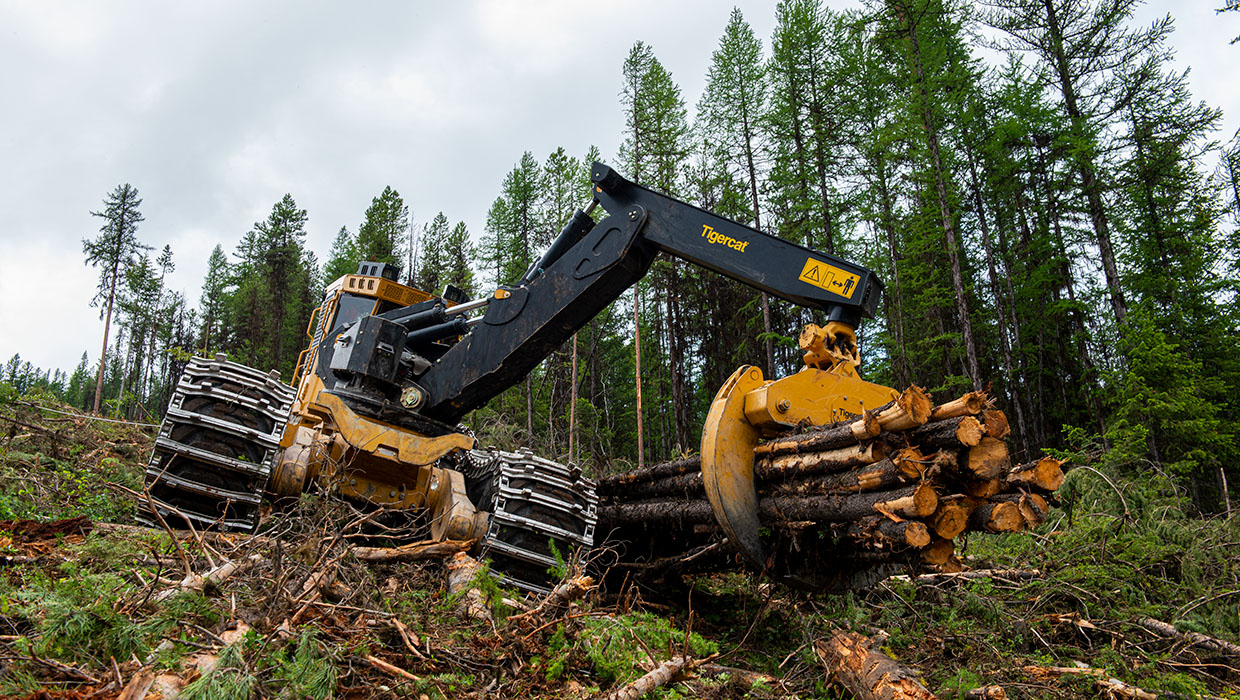 635H swing boom skidder in the field