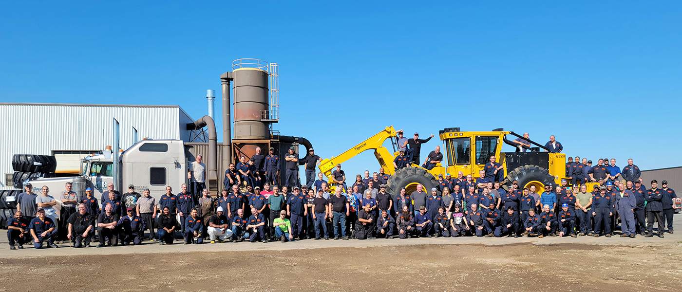 Image of Members of the H-series design and production teams gathered for a photo.