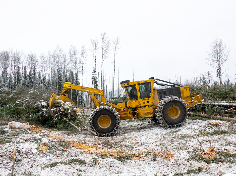 Tigercat skidder operating in winter.