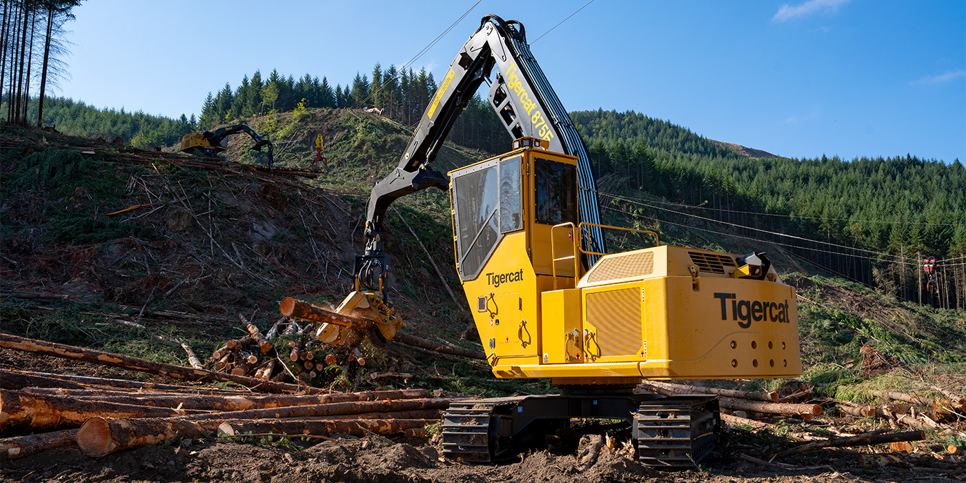 Na PLC do ano passado no estado de Washington, Sabrina operou uma máquina-base Tigercat 875E equipado com o mais recente cabeçote de processamento da Tigercat, o 573.
