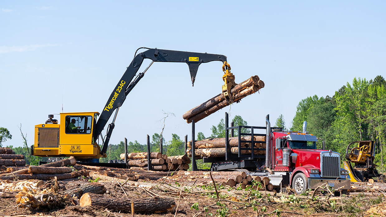 Image of a Tigercat 234C loader working in the field