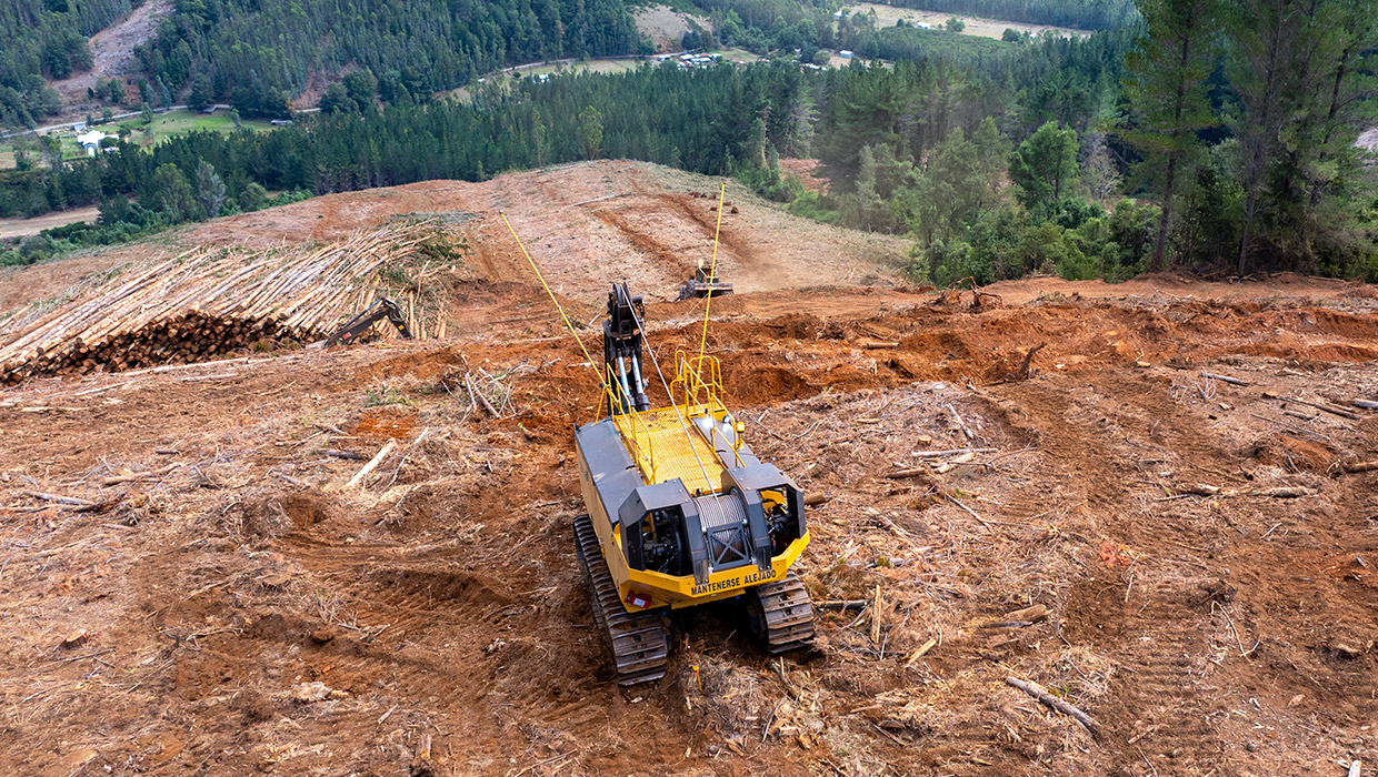 Image of a Tigercat 120 winch assist working in the field