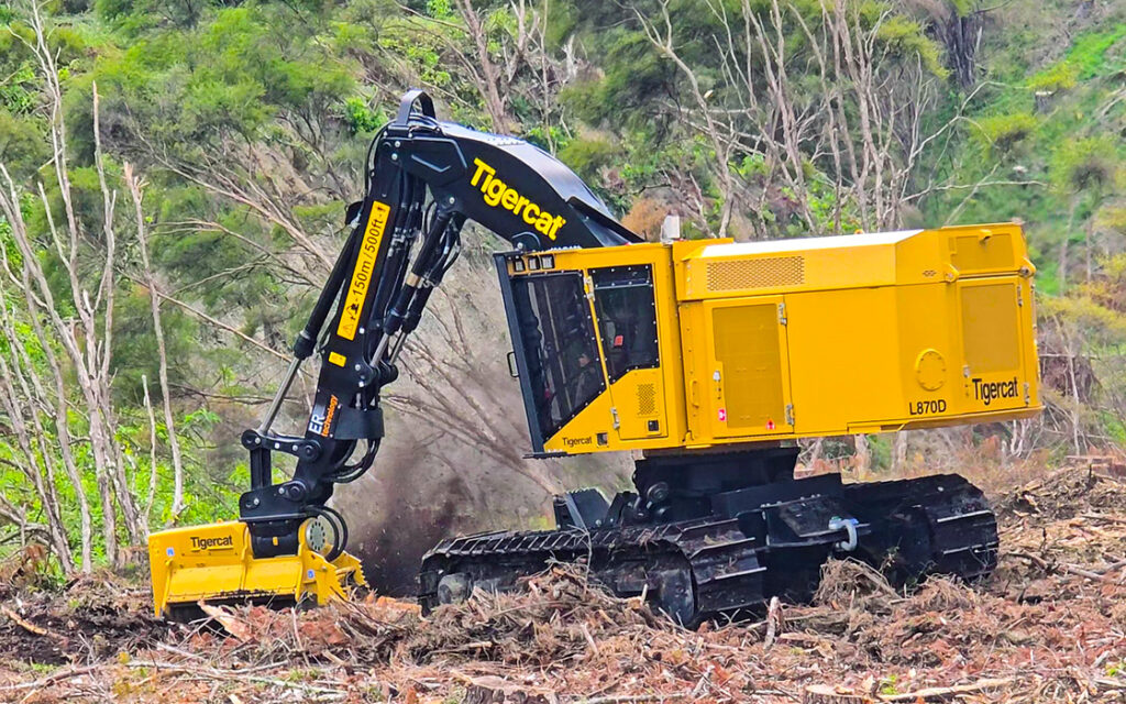Tigercat track carrier with mulching attachment