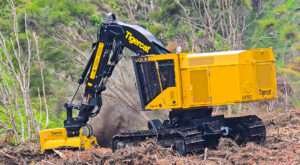 Tigercat track carrier with mulching attachment