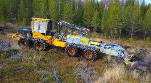 A Tigercat 1075C scarifier working in the field