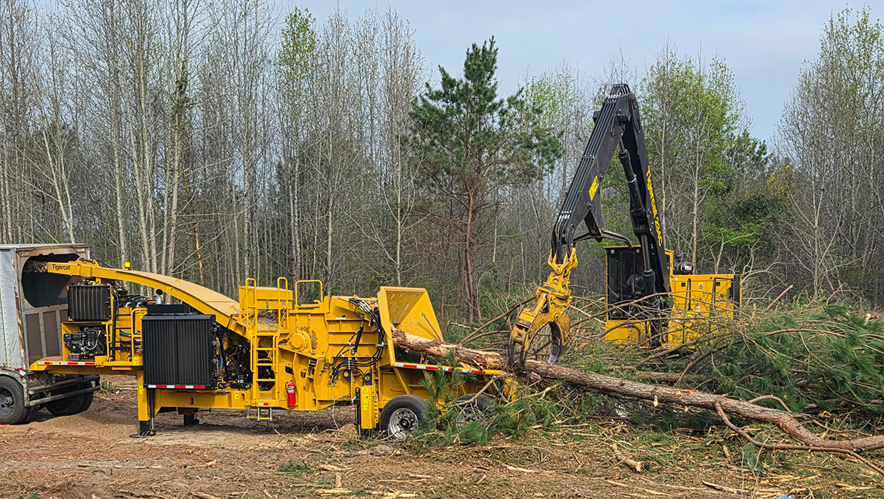 Image of a Tigercat 6440 chipper working in the field.