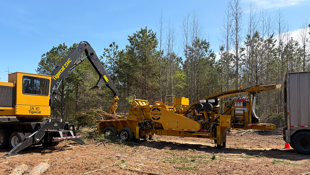 Image of a Tigercat 6440 chipper working in the field.
