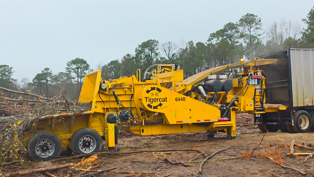 Image of a Tigercat 6440 chipper working in the field.