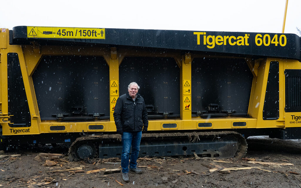 Blair Sheppard standing in front of 6040 carbonizer