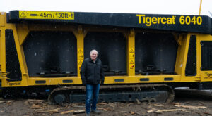 Blair Sheppard standing in front of 6040 carbonizer