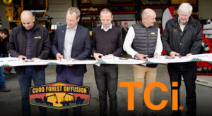 Executives ribbon cutting at new Sarrebourg location.